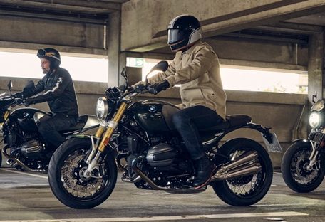 BMW bikes riding in car park