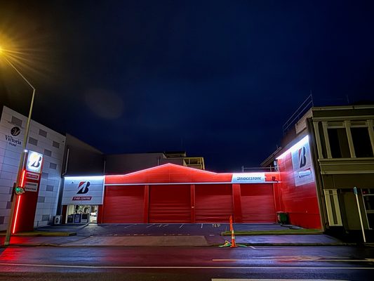 Bridgestone Select Dunedin's other branch, closed after hours featuring glossy white lighting