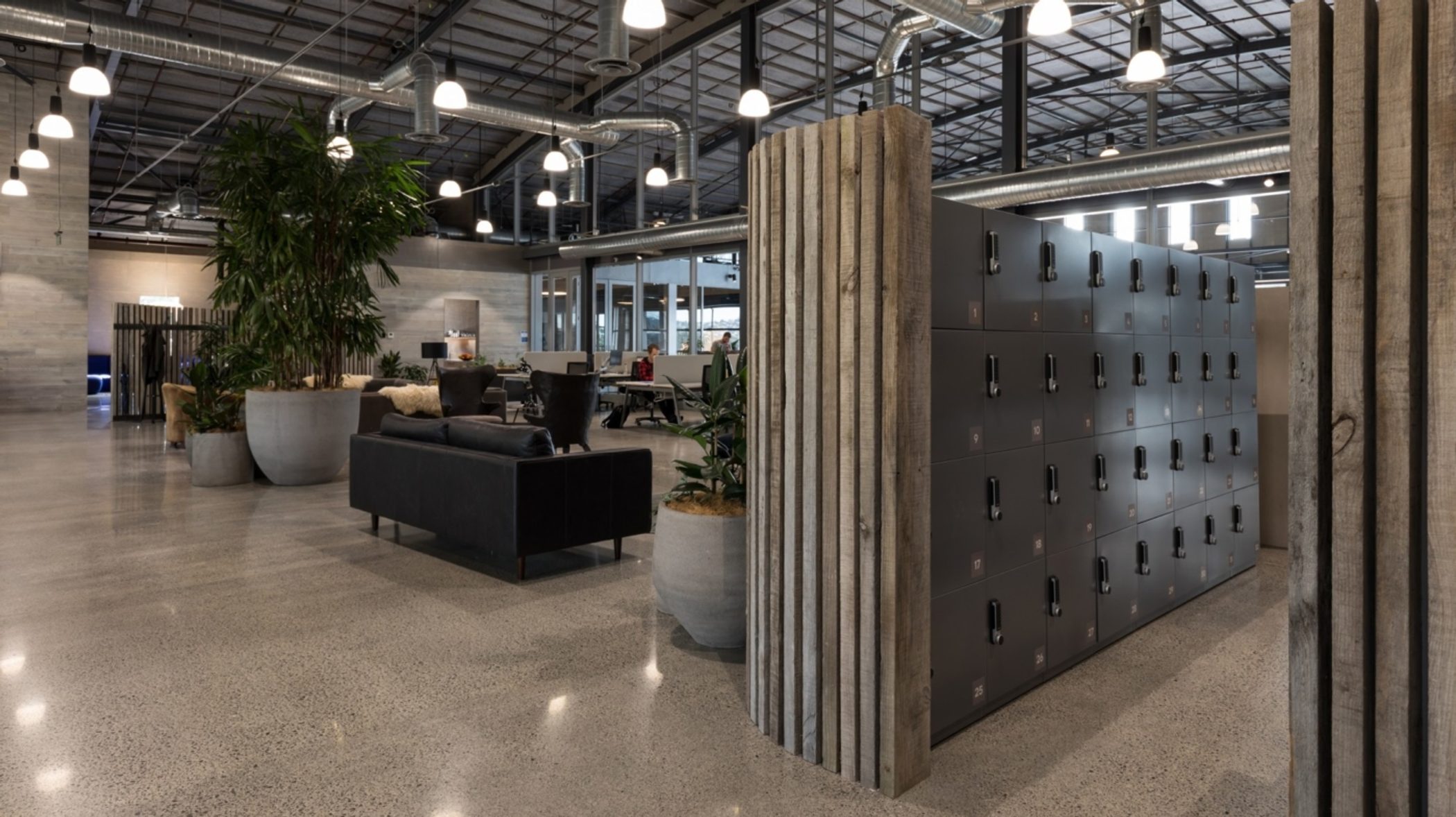 Coworking space with shared lockers and soft-seating