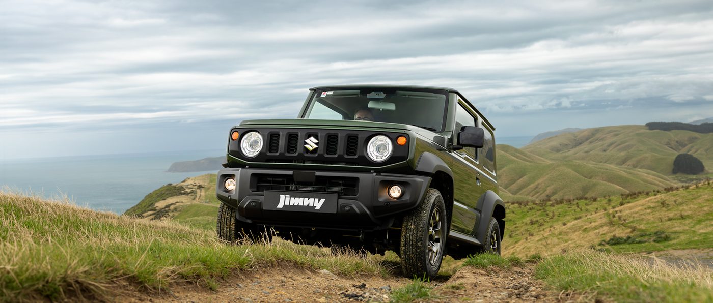 Suzuki Jimny DR WDing Over Hill
